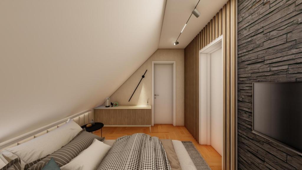 a room with a bed and a flat screen tv at Apart Hotel Gondola in Jahorina