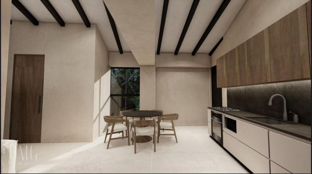 eine Küche mit einem Tisch und Stühlen darin in der Unterkunft Moderno y luminoso apartamento de 3 habitaciones 314 in Medellín