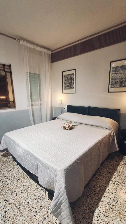 En eller flere senge i et værelse på Il Carebbio - A r t & D e si g n