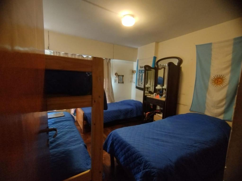 Postel nebo postele na pokoji v ubytování Cama en habitacion compartida