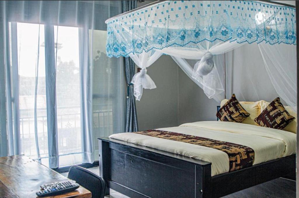 Ένα ή περισσότερα κρεβάτια σε δωμάτιο στο Sqore Lounge