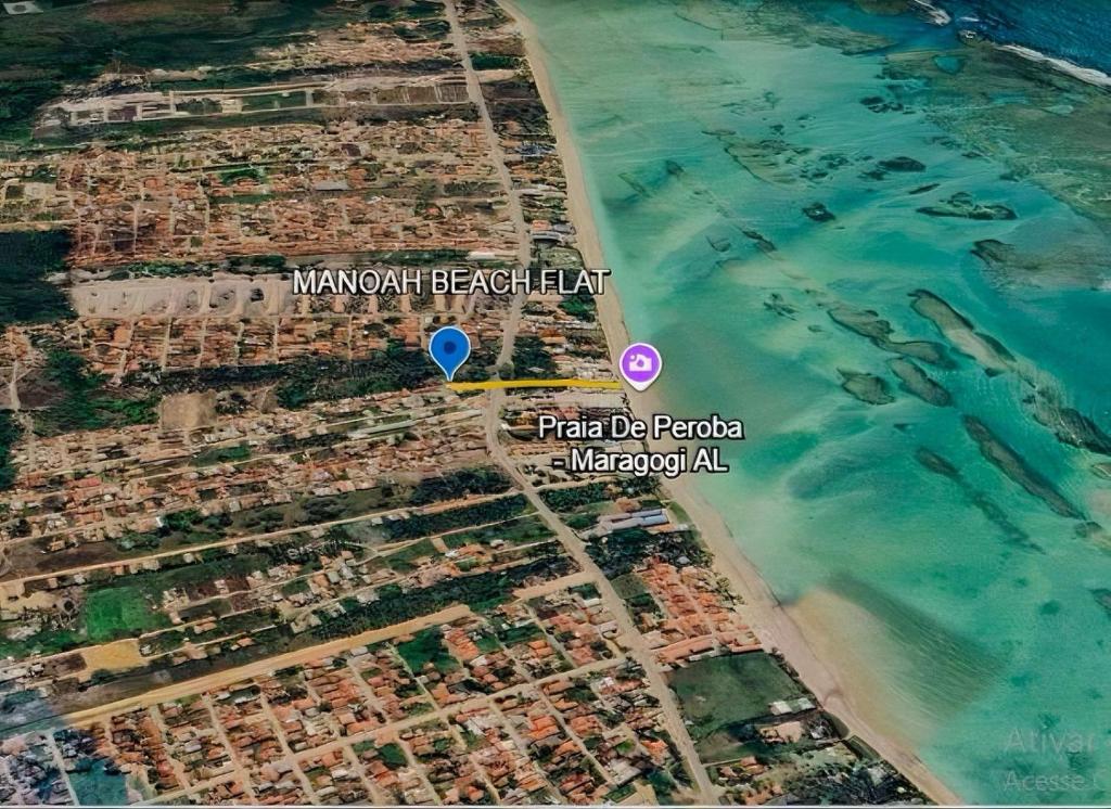 una vista aerea della spiaggia e dell'oceano di Apartamento Paraíso Lua e Mar - Manoah Beach Flats a Maragogi