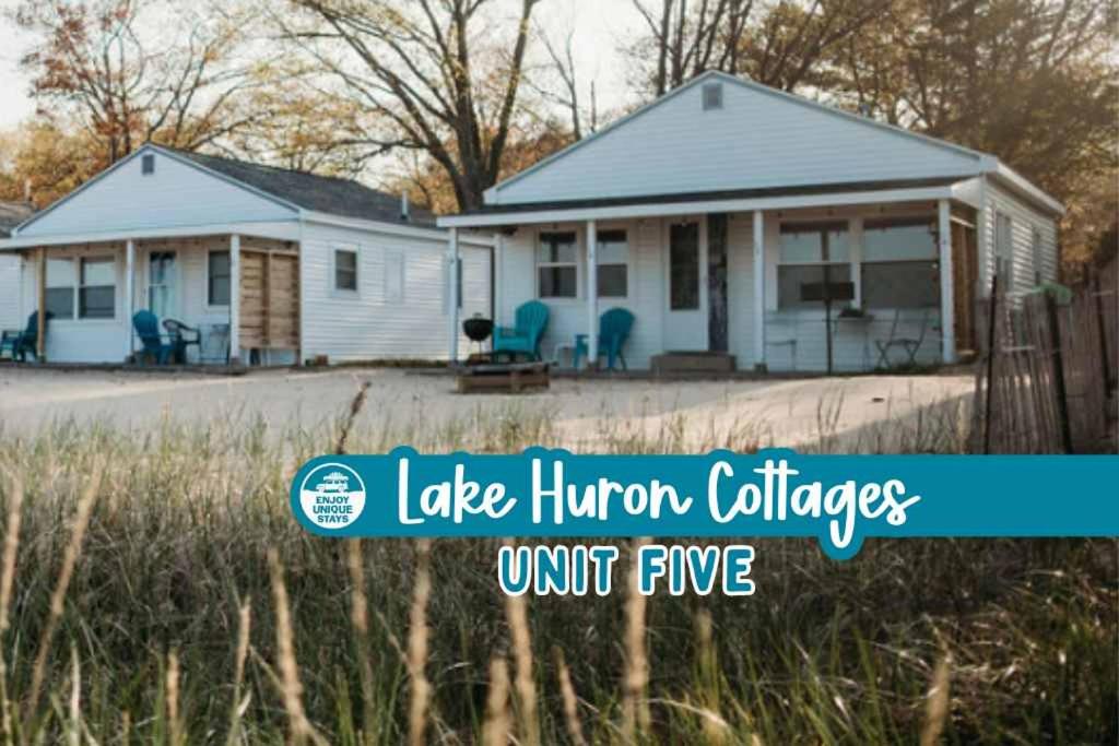 a house with the words lake humpump homes unit five at New renovated bathroom & new roof - Lake Huron 5 in Lincoln Junction