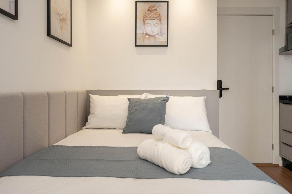 Postel nebo postele na pokoji v ubytování Modernidade no Batel | Suíte luxo