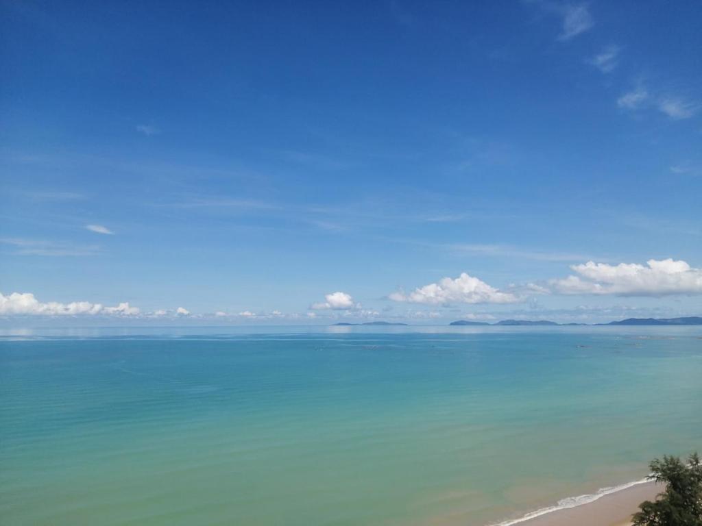 a view of the ocean from the beach at Apartment on Beach, Stunning Views, Rayong in Ban Phayun