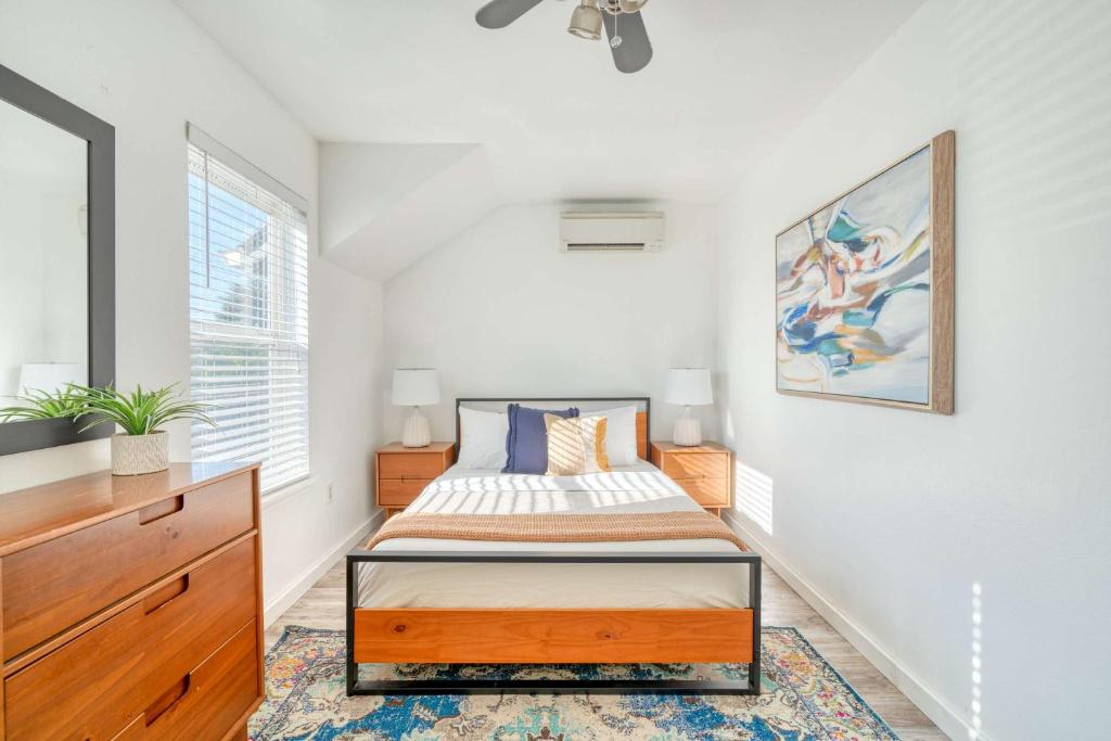 a bedroom with a bed and a dresser at Stay Portland - Alberta Arts Luxury, Sleeps 6, Walk Score 99 in Portland