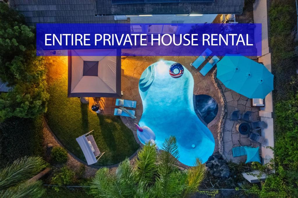 an image of an entrance to an entire pineapple house rental at Entire Private Hot Tub, King Bed, Garage, Grand View, 3BR-3Bth, Available Now in San Diego