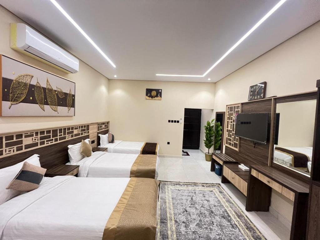Postel nebo postele na pokoji v ubytování روح المدينة السكنية