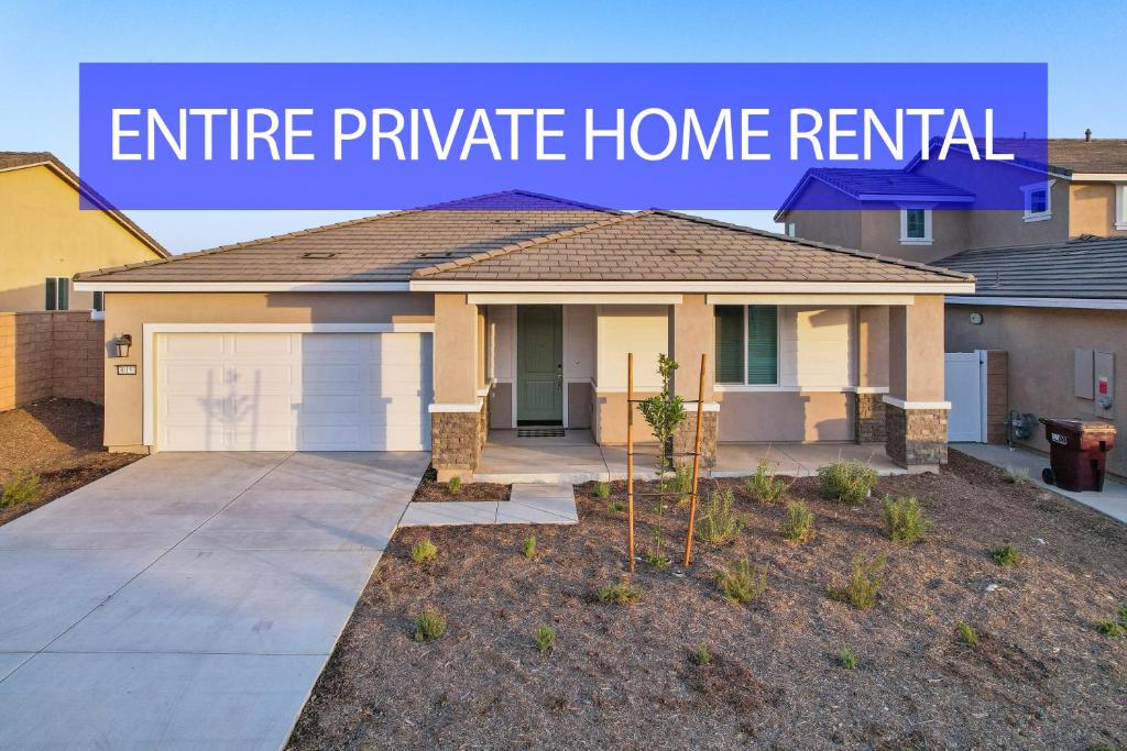 a house with a garage and the words entire private home rental at Entire Private 4-BR, Mountain Edge, New House, Ranch, Gated Yard, Available Now in Menifee