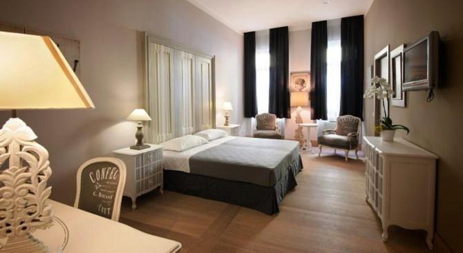 Postel nebo postele na pokoji v ubytování Locanda In Borgo Garnì & Wellness