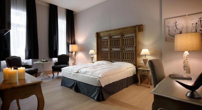 Postel nebo postele na pokoji v ubytování Locanda In Borgo Garnì & Wellness