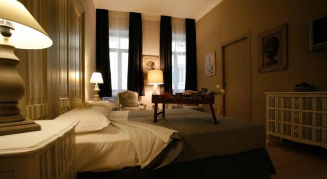 Postel nebo postele na pokoji v ubytování Locanda In Borgo Garnì & Wellness