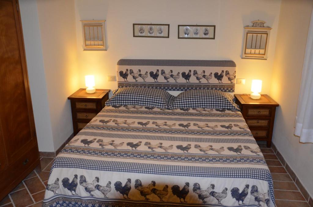 Postel nebo postele na pokoji v ubytování Agriturismo Sant'Alfredo