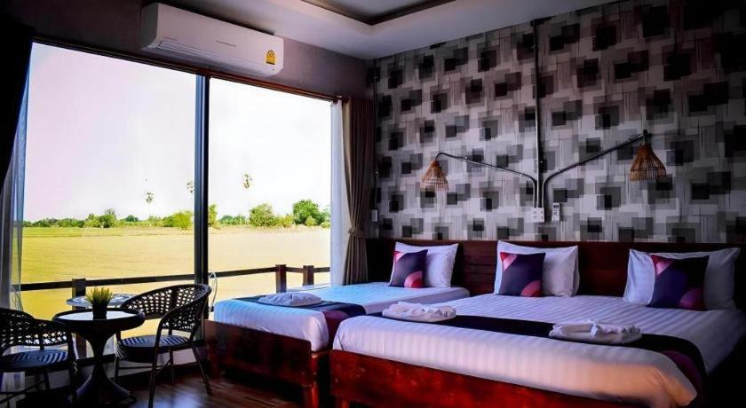 Voodi või voodid majutusasutuse 111 Resort and Spa toas