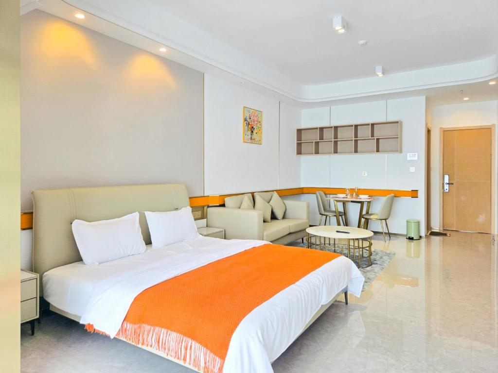 Ένα ή περισσότερα κρεβάτια σε δωμάτιο στο Urban Sanctuary Riva Phnom Penh