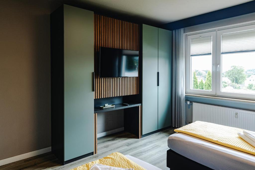 Postel nebo postele na pokoji v ubytování SchönHier