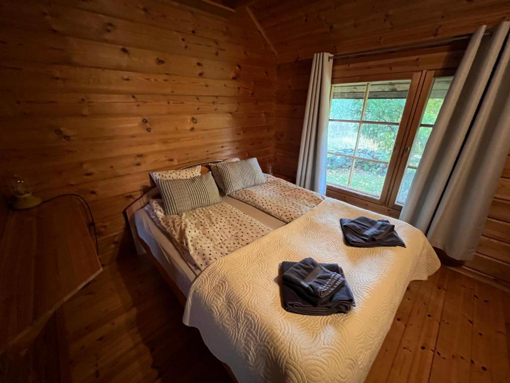 Una cama o camas en una habitación de Kangru Holiday Home