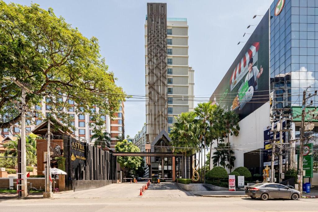 a street in a city with tall buildings at Astra condo - Deluxe room in Chiang Mai