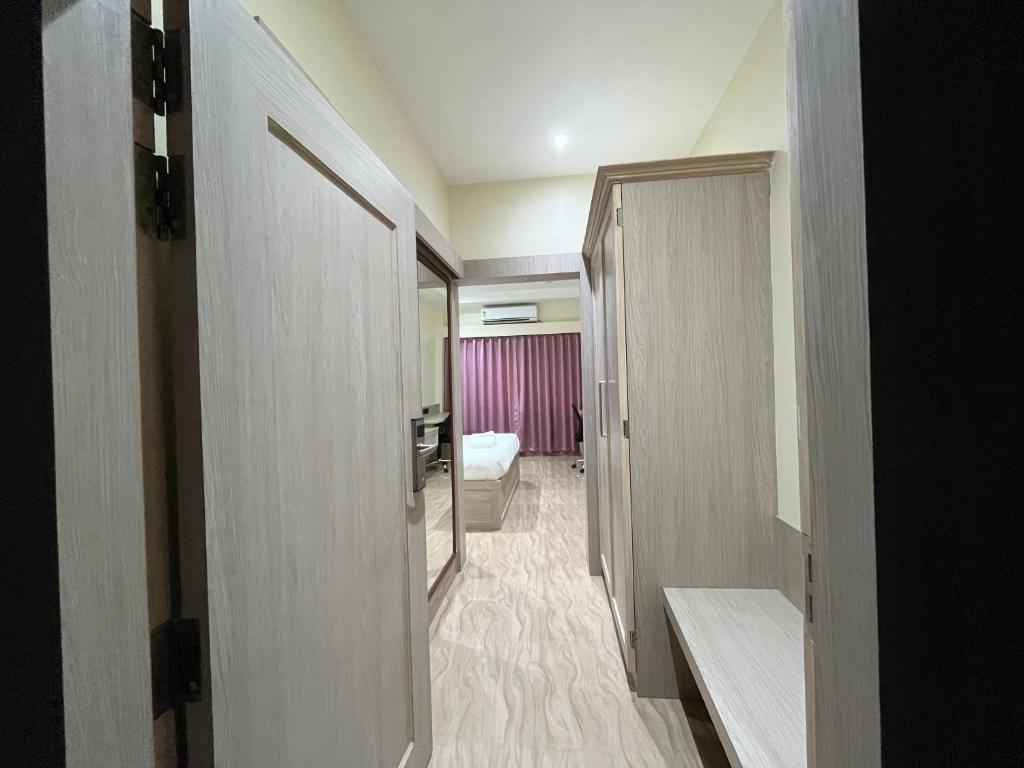 Postel nebo postele na pokoji v ubytování Dibang Hotel & Resort