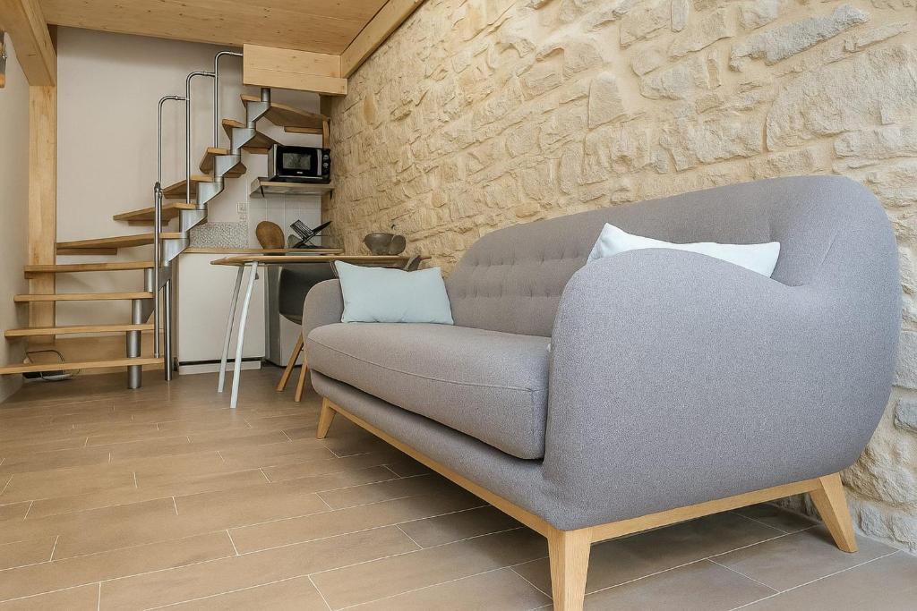 Χώρος καθιστικού στο Lyonnais charm Atypical duplex near Part-Dieu station