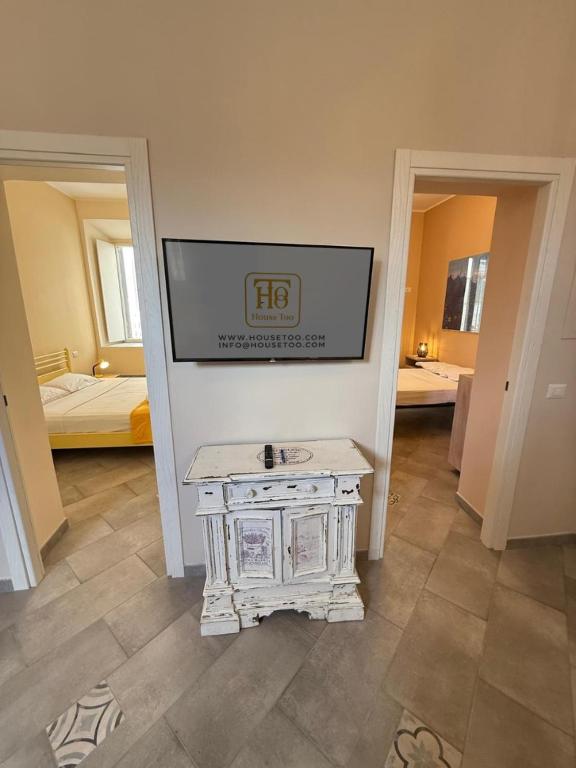 a room with a table in the middle of a room at House - Cesare Balbo - Too in Rome