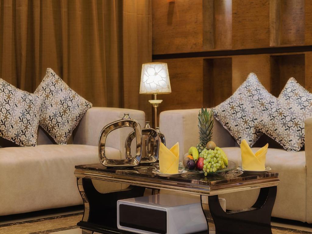 Posezení v ubytování Mrfaaliah for Furnished Apartments مرفا عاليه للشقق المخدومة