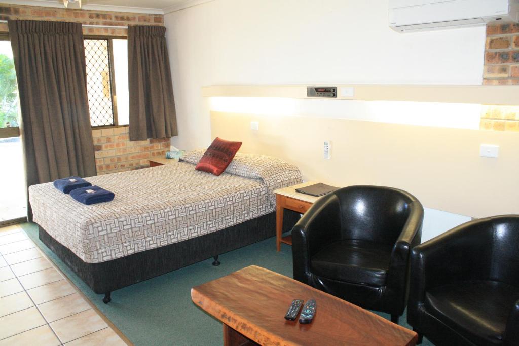 Postel nebo postele na pokoji v ubytování Central Motel Gin Gin