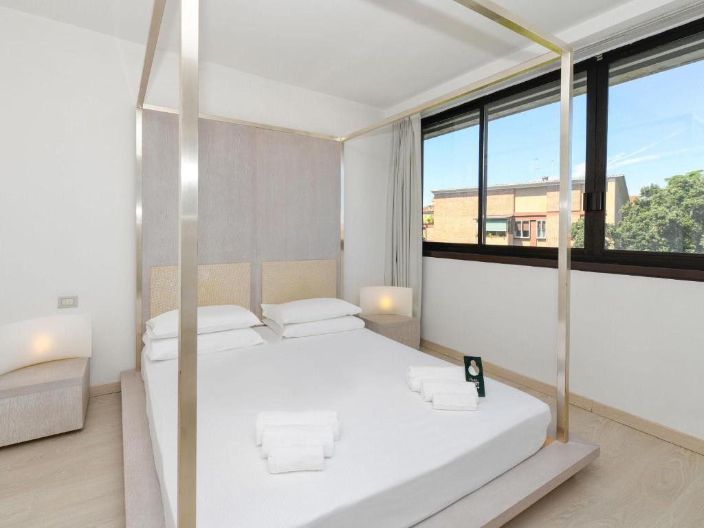 Postel nebo postele na pokoji v ubytování B&B HOTEL Padova Methis