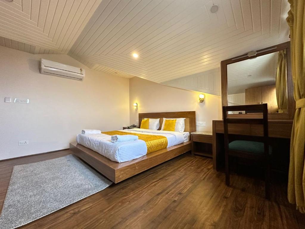 Ένα ή περισσότερα κρεβάτια σε δωμάτιο στο Luxe Haven Residency