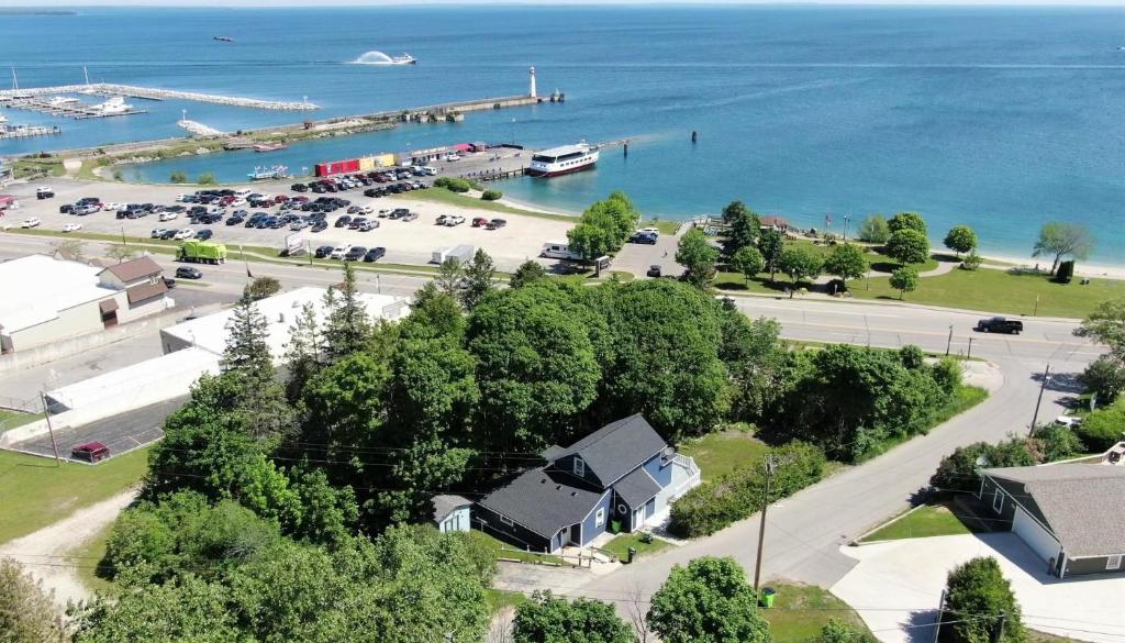 an aerial view of a harbor with a marina at The Blue Bliss in Saint Ignace