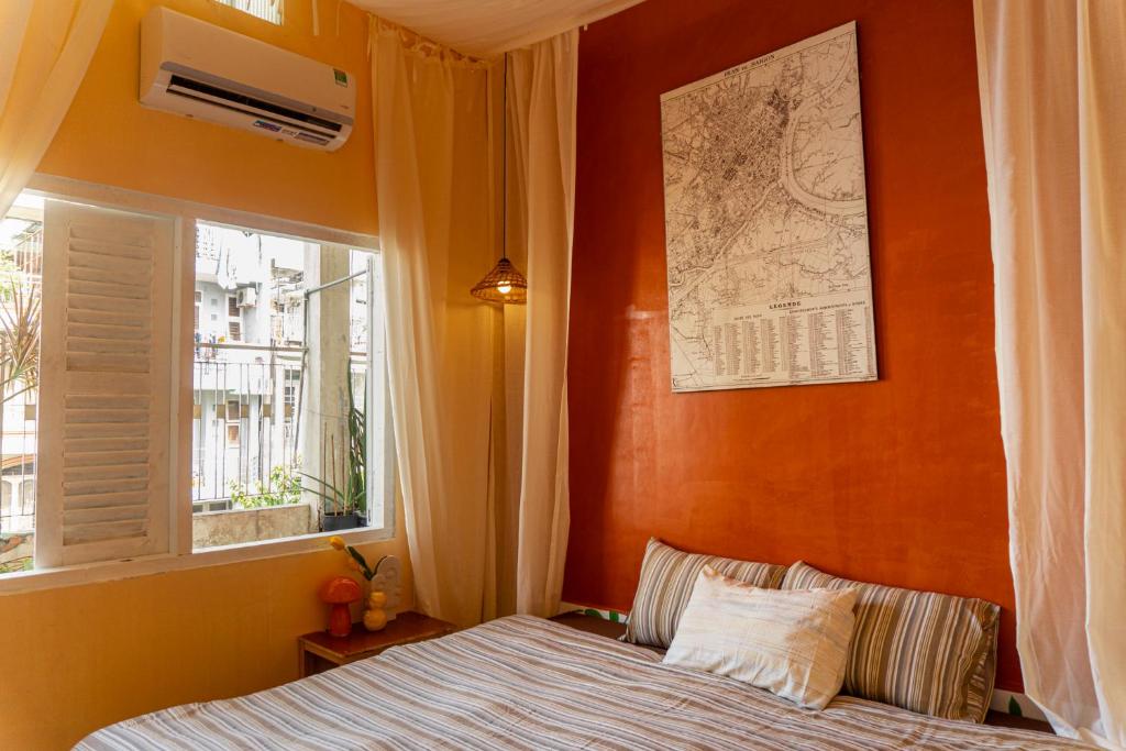 Postel nebo postele na pokoji v ubytování THERoom - Nguyễn Công Trứ