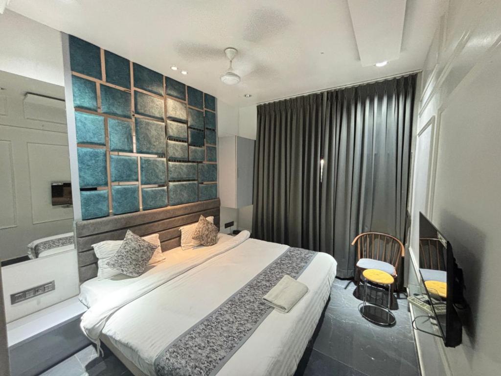 Postel nebo postele na pokoji v ubytování Hotel the lowell