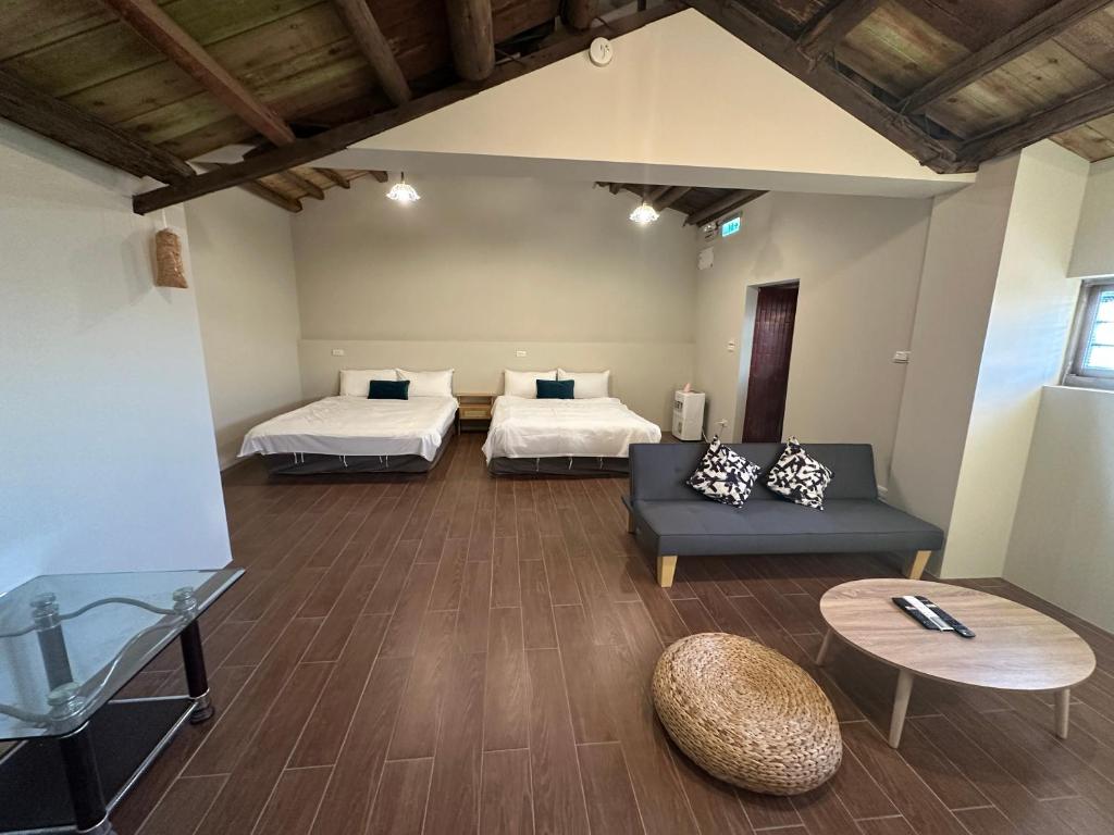 Ένα ή περισσότερα κρεβάτια σε δωμάτιο στο Jiufen Yunhai Yazhu Homestay