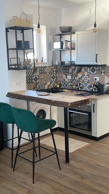 Kuchyň nebo kuchyňský kout v ubytování Bachner Rental Fagaras