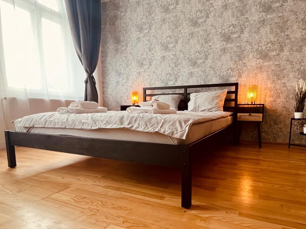 Postel nebo postele na pokoji v ubytování Avotu ApartHotel `self check-in`