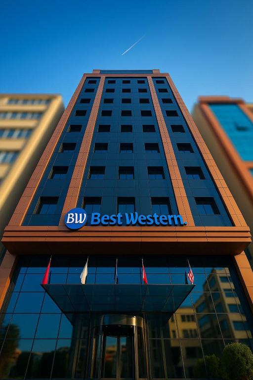 a building with the best western sign on it at Best Western Izmir Hotel in Izmir