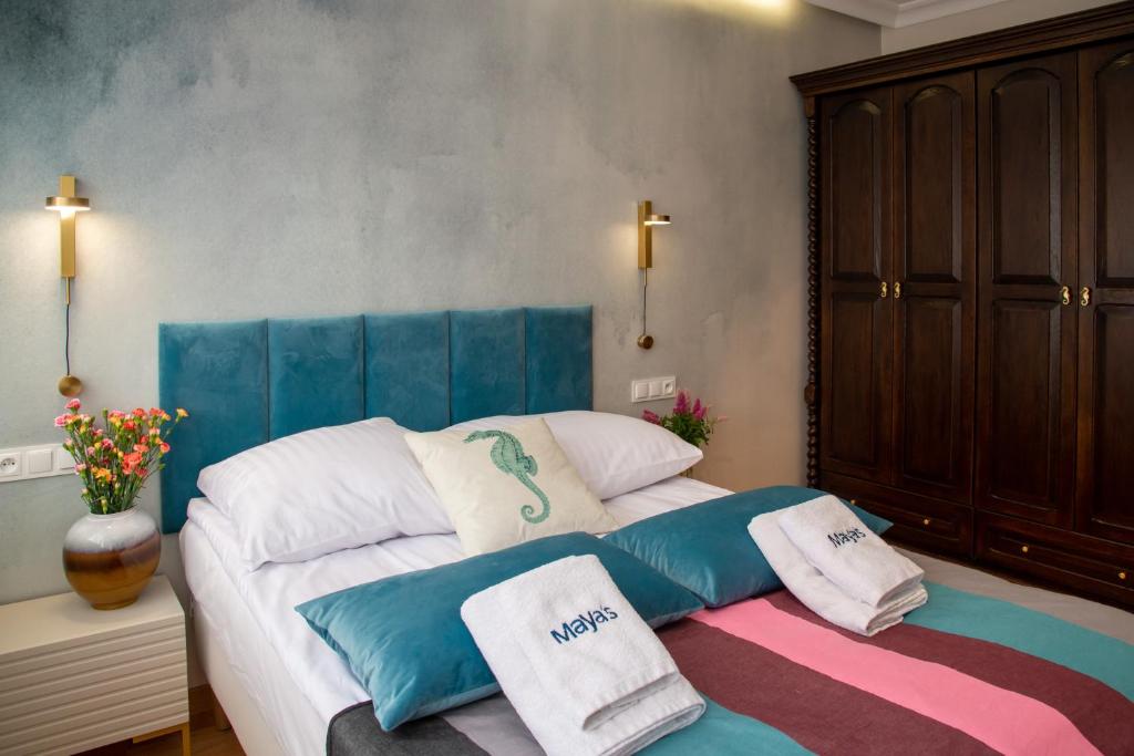 Postel nebo postele na pokoji v ubytování Maya's Flats & Resorts 102 - Premium Apartment Prz