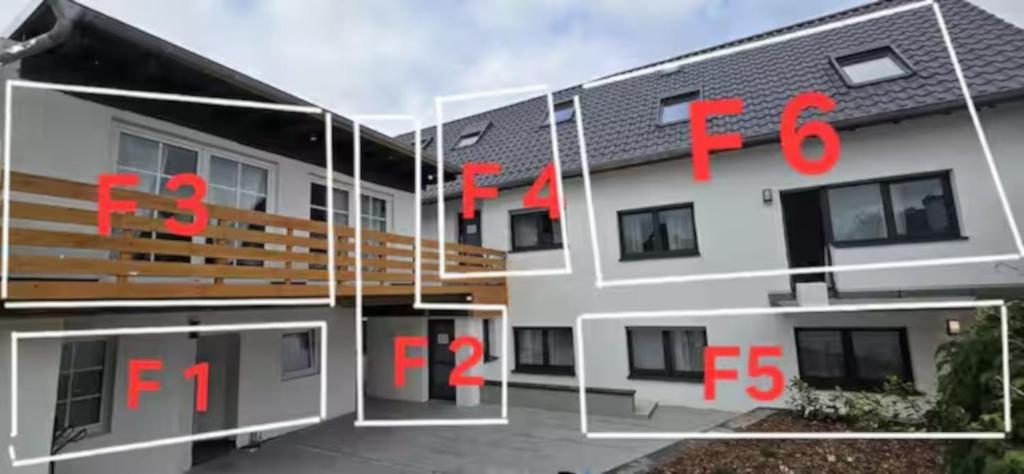 a rendering of a building with red numbers on it at F3 - 1 Zimmer Wohnung in Offenbach
