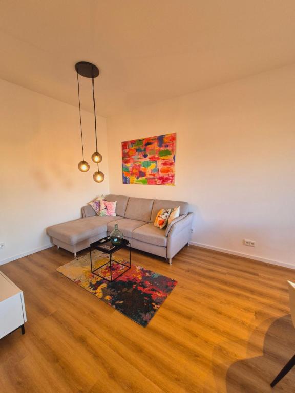 Posezení v ubytování Heinsberg City Apartment - Stil trifft Farbe!