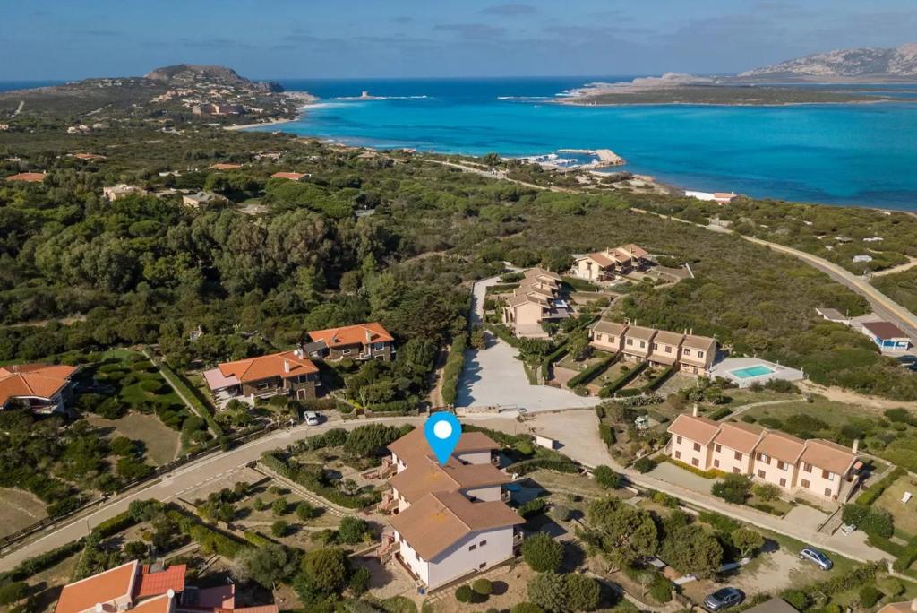 an aerial view of a house with the ocean at AffittaSardegna-Villetta Trilo Janna in Stintino