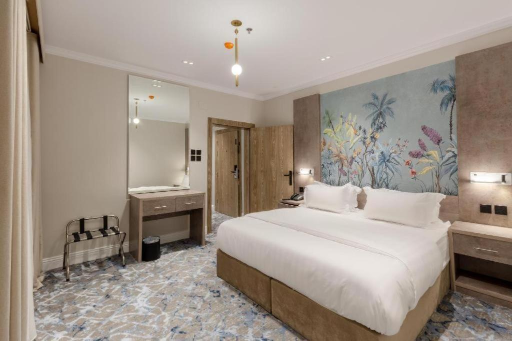 Postel nebo postele na pokoji v ubytování فندق فاتوران