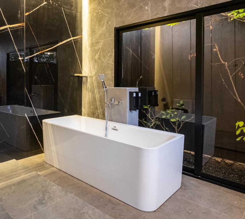 Ένα μπάνιο στο The Arch Casa - Design Hotel Pai