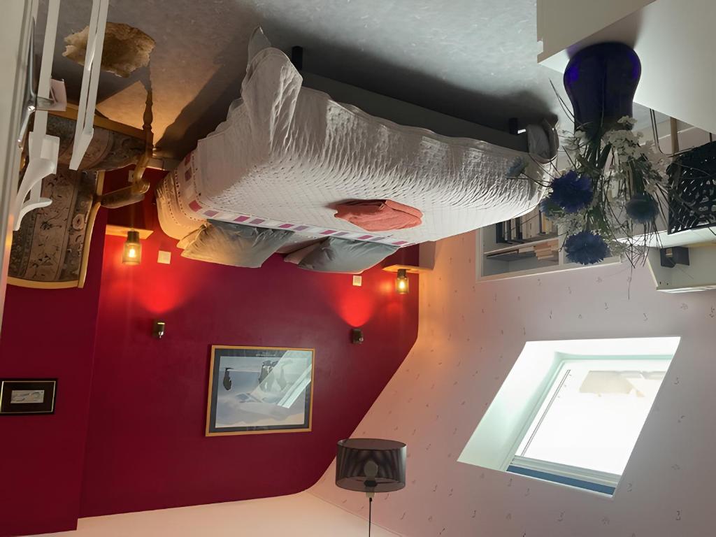 Una cama o camas en una habitación de Chambre d'hôtes à Lesneven