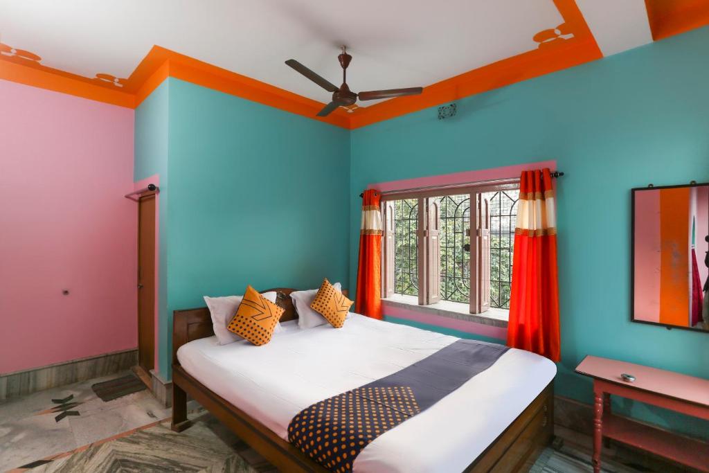 Postel nebo postele na pokoji v ubytování SPOT ON Loknath Hotel