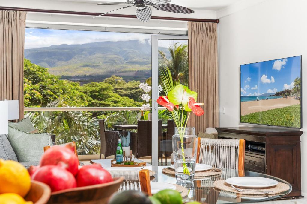 a dining room with a view of the ocean at Maui Luxury Mountain-View Villa at Honua Kai in Lahaina