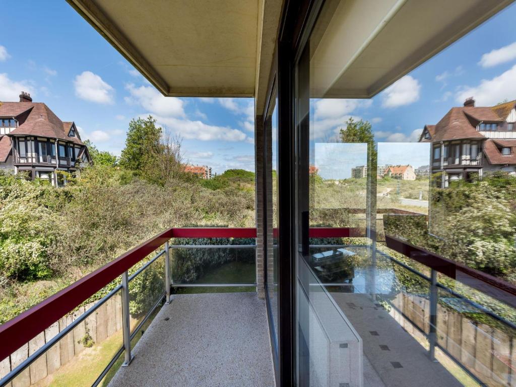 a view from the balcony of a house at Aubépine premier in Sint-Idesbald
