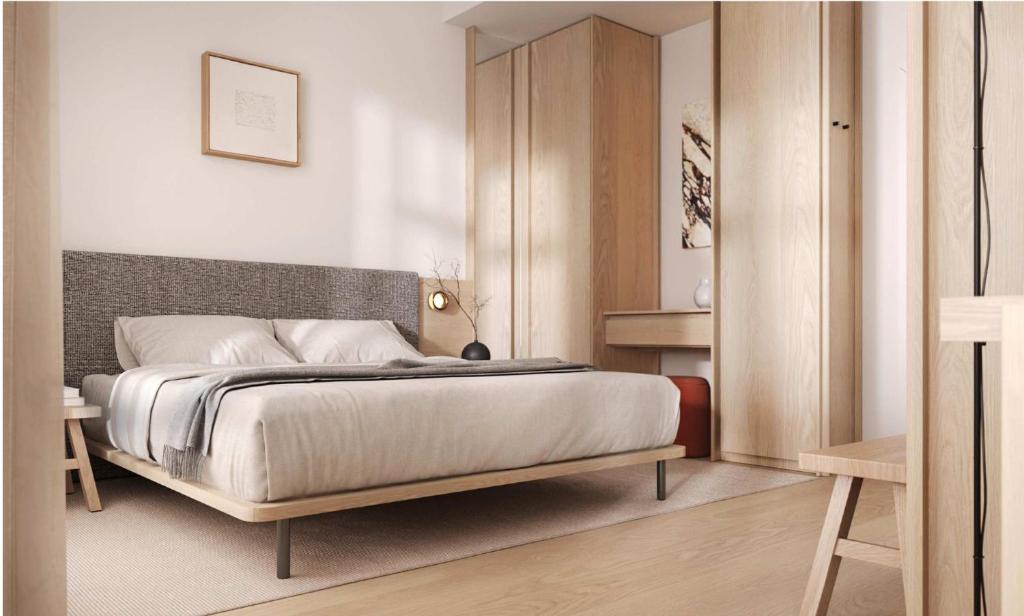 a bedroom with a large bed in a room at FortyPlusOne Hotel Vienna in Vienna