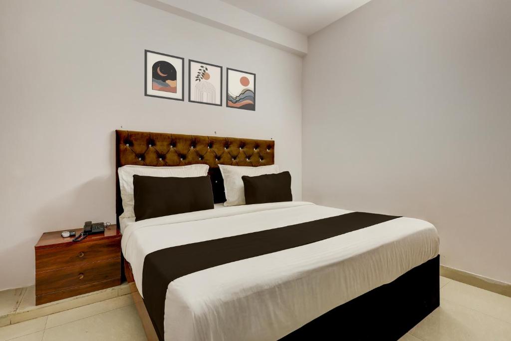 Ένα ή περισσότερα κρεβάτια σε δωμάτιο στο Collection O Sector 7 Dwarka Formerly Aakarshan Residency