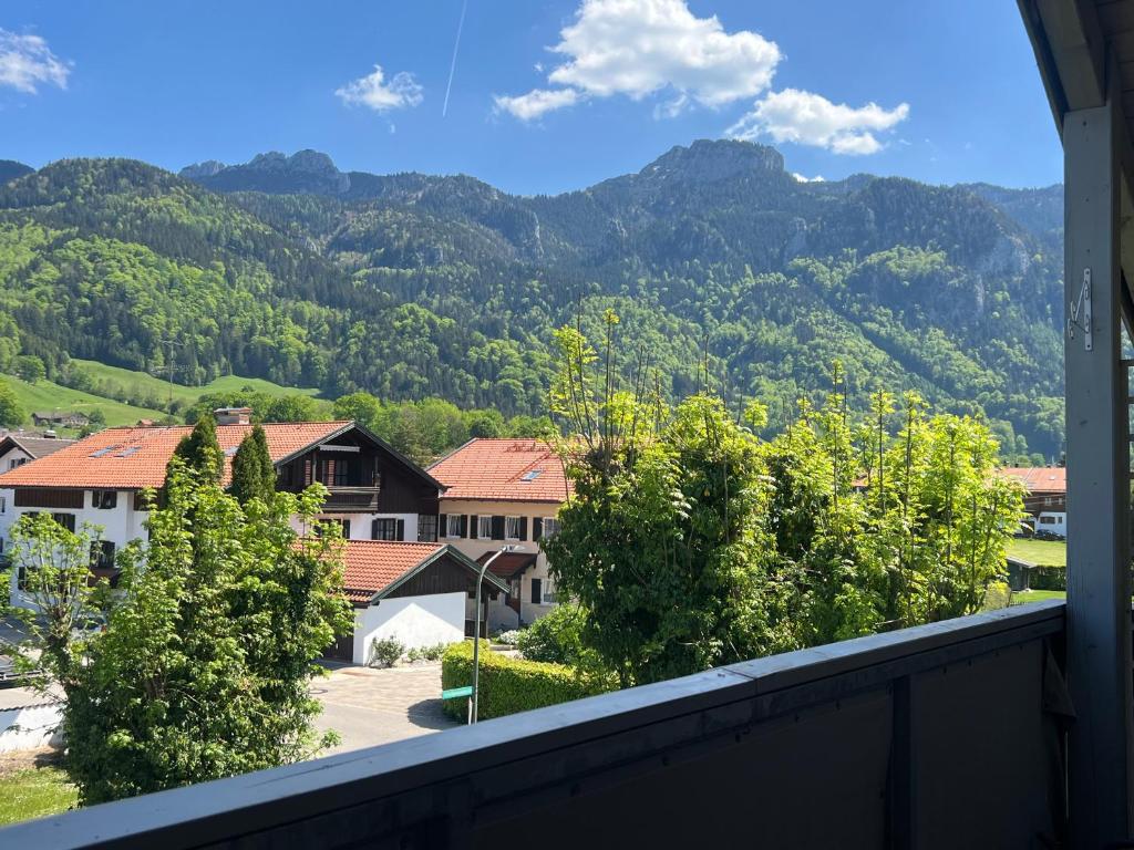 a view of the mountains from the balcony of a house at ciao-aschau FeWo Bergsonne Kurtenbach in Aschau