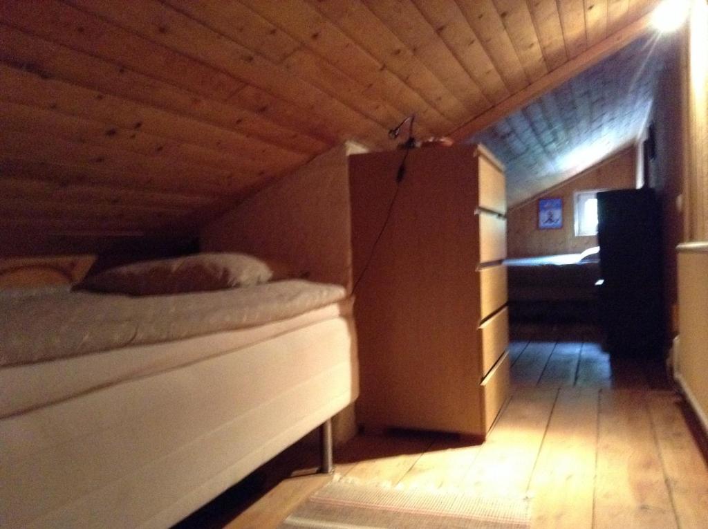 Postel nebo postele na pokoji v ubytování Lusthuset